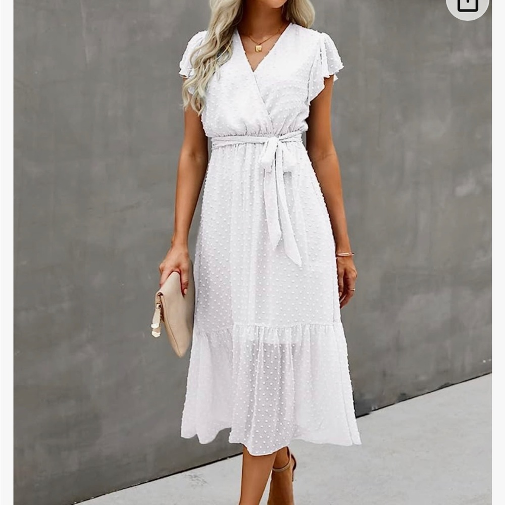 White dress perfect for bach party, engagement party, or rehearsal dinner